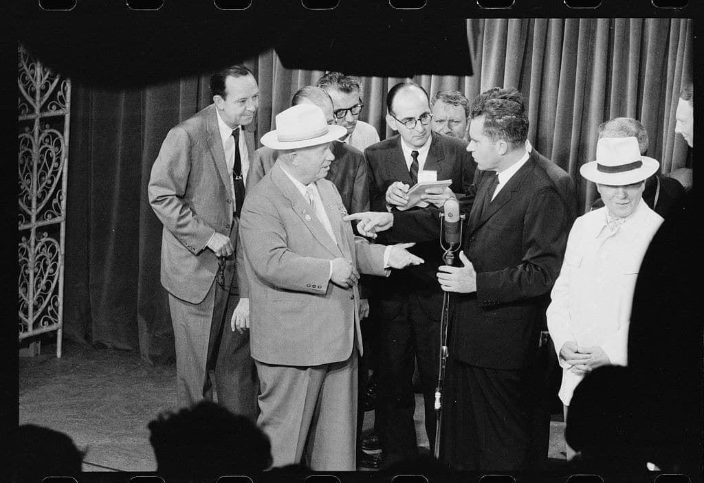 Nixon and Khrushchev in close conversation at the American National Exhibition in Moscow.