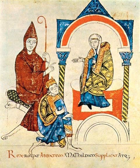A twelfth-century manuscript miniature showing Henry IV kneeling before Matilda of Tuscany and Abbot Hugh of Cluny.