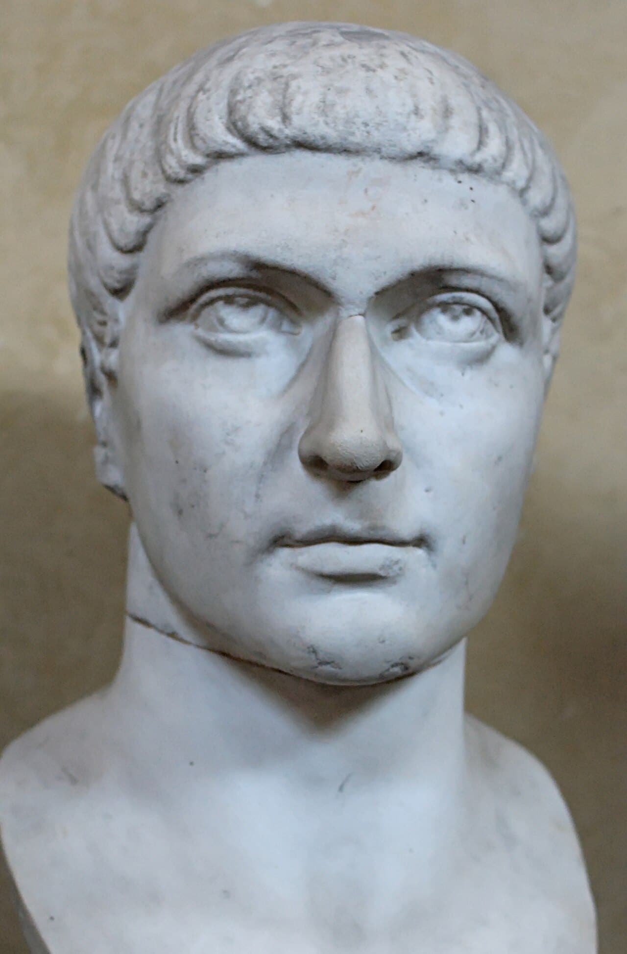 A Roman marble head of the emperor Constantine the Great, photographed against a plain background.