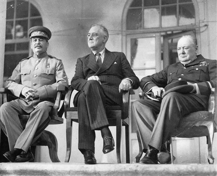 The three leaders and their delegations photographed at the Tehran conference.